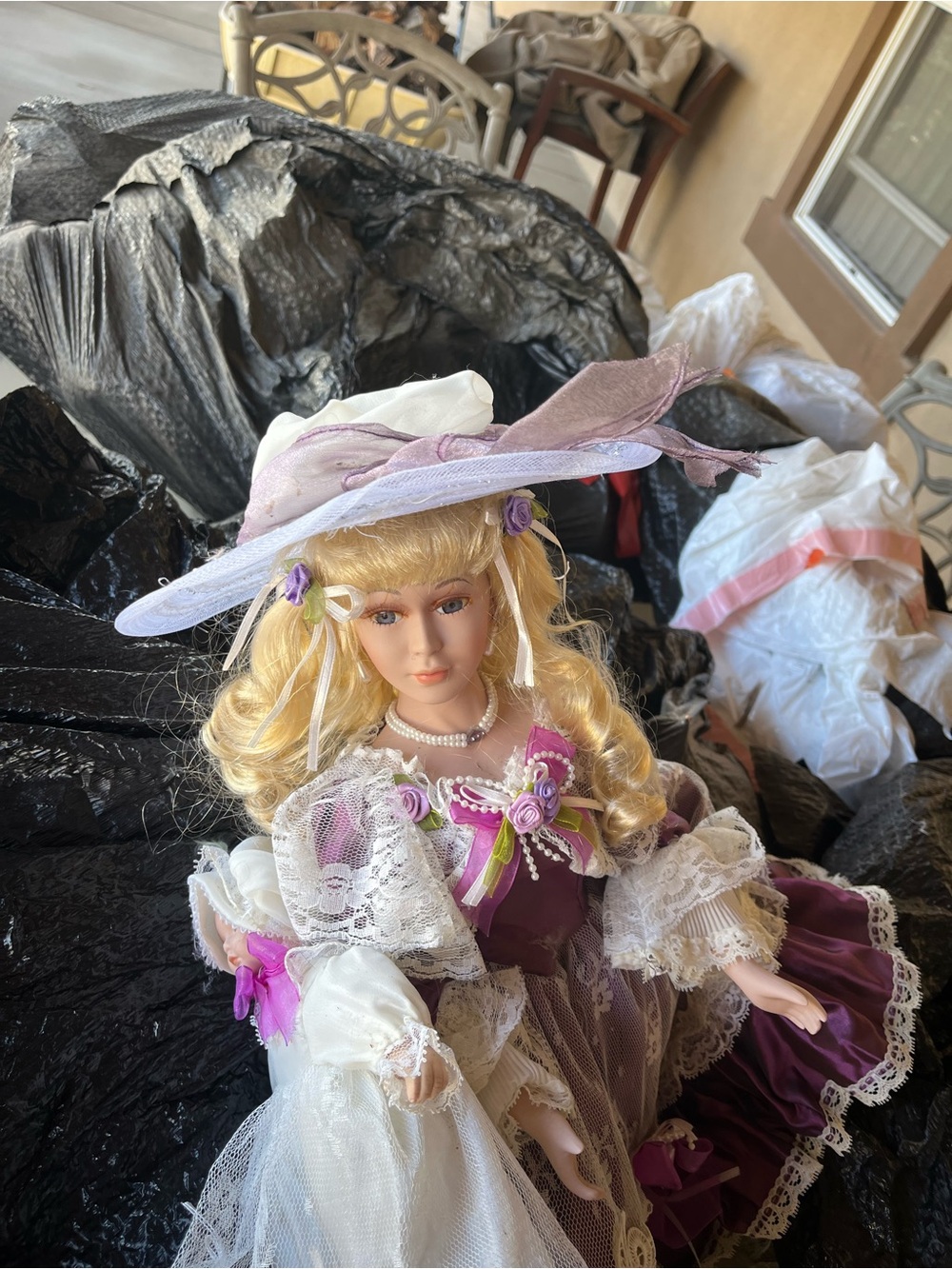Porcelain Victorian-Style Doll in Purple and White Dress